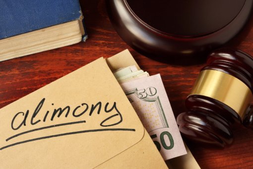 Alimony, Mallet, and Documents on Spring Hill Family Law Attorney's Table